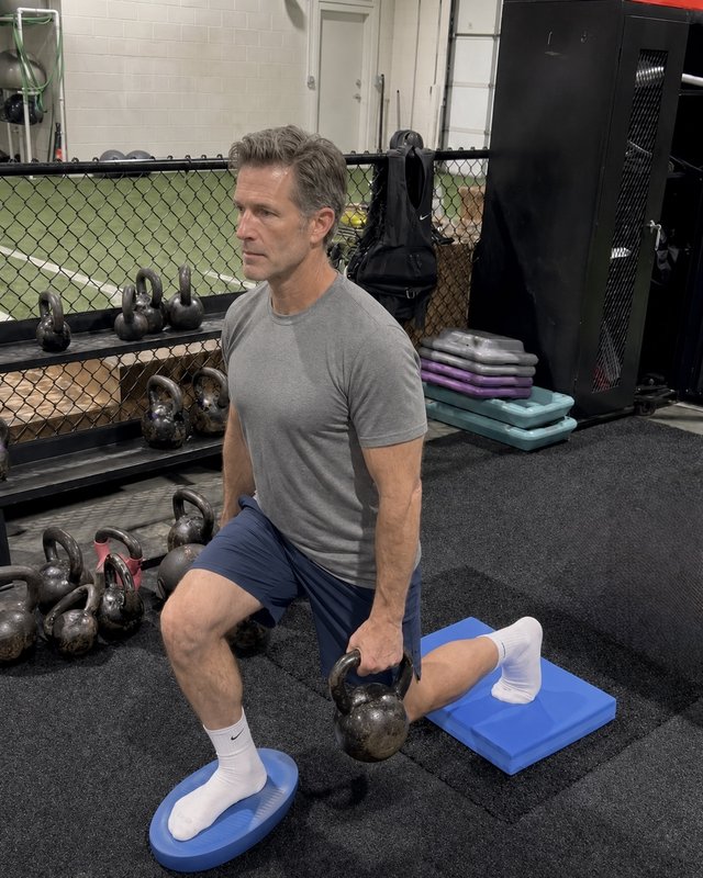 MDC Wellness — Standing knee raise